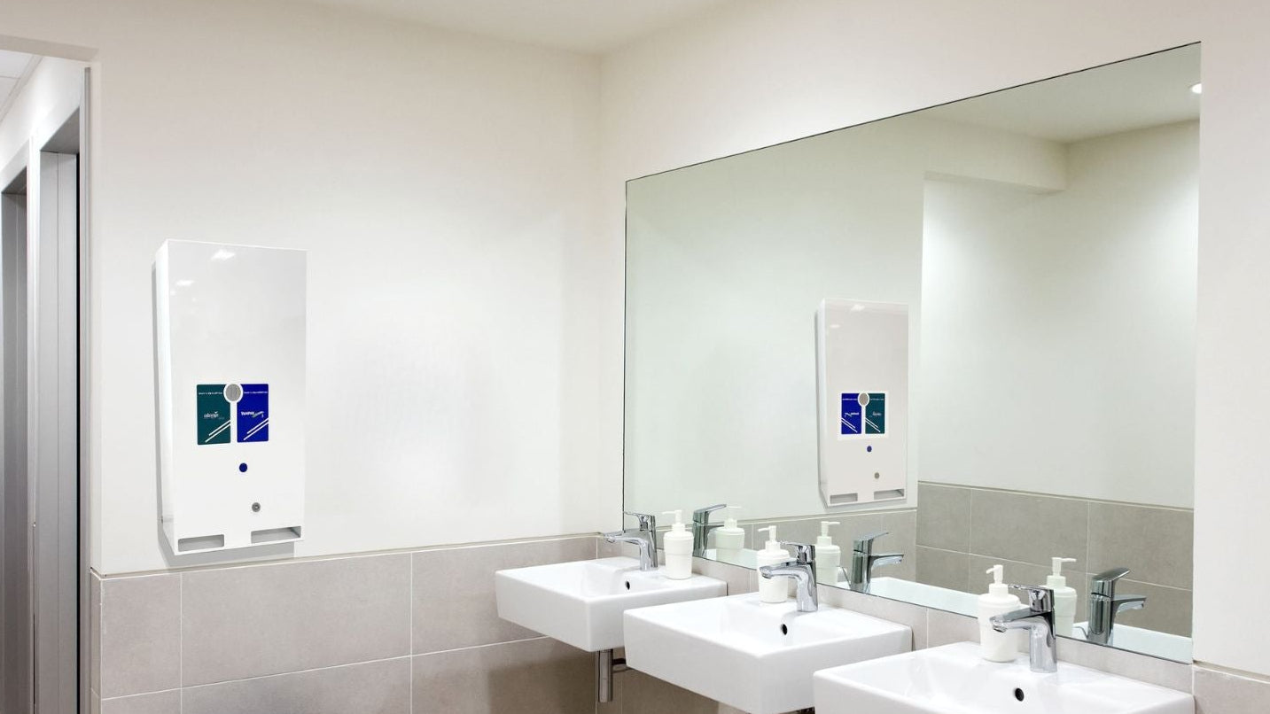 Dual vending: Autovend dispenser fitted in a washroom