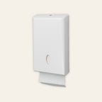 Compact hand towel dispenser in white
