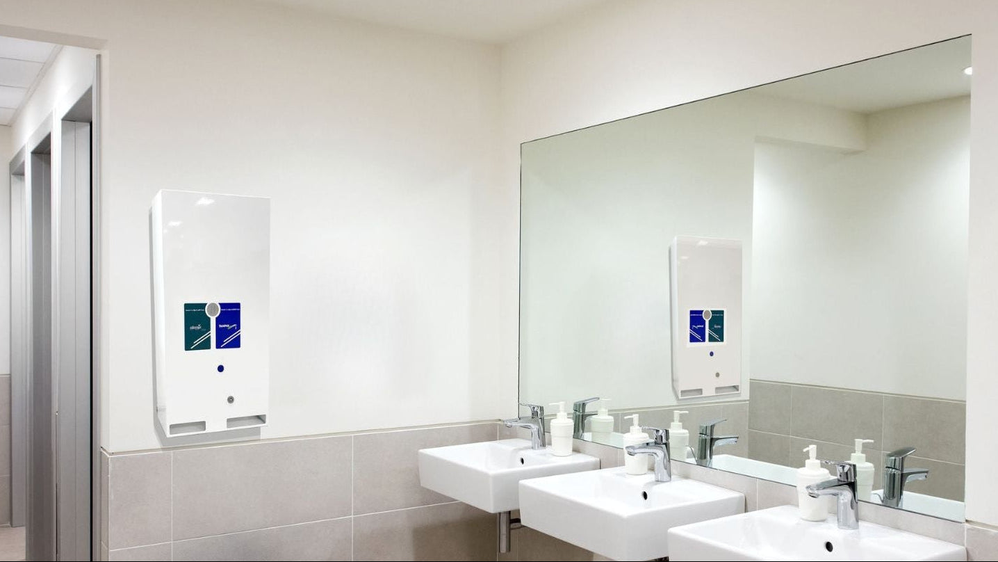 Dual vending: Autovend dispenser fitted in a modern washroom
