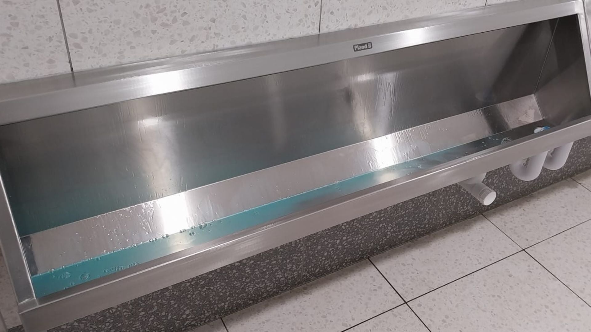 Trough after a deep clean, fully restored