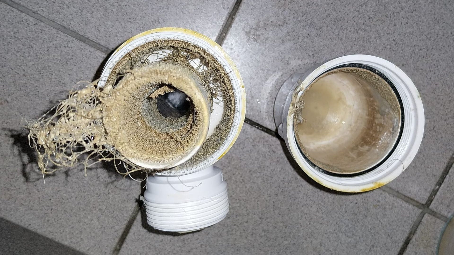 Urinal before a deep clean, showing staining