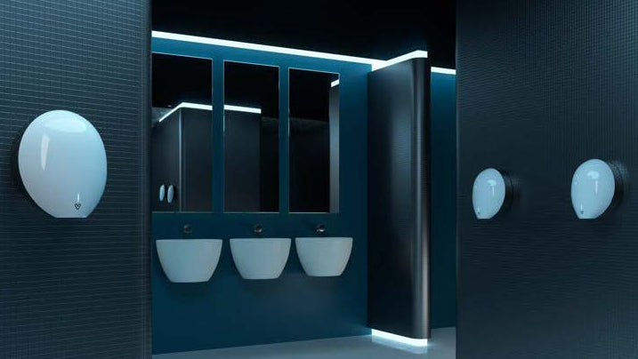 Hand dryers: Ultimate+ hand dryer in white in a commercial washroom