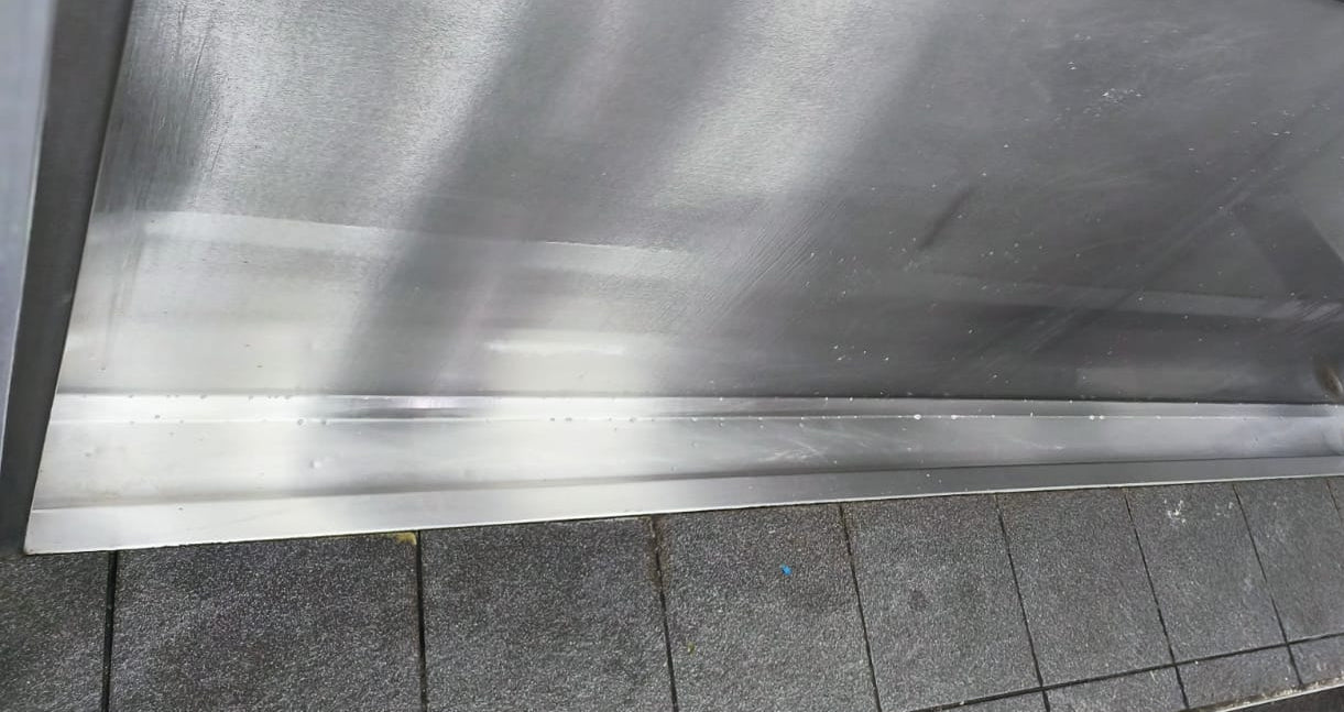 Trough deep clean: a trough after cleaning in a men's washroom