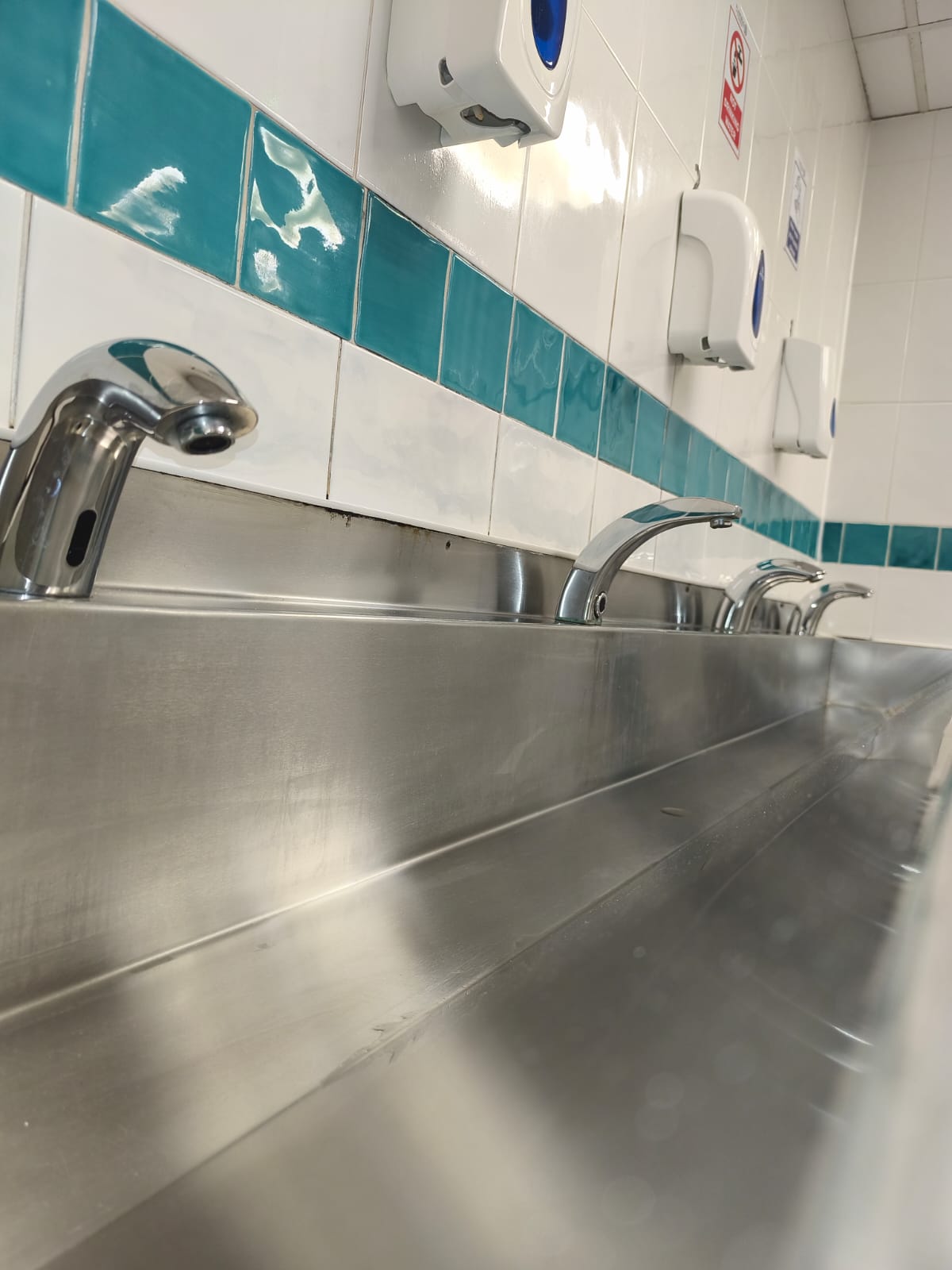 Sink after a deep clean in a commercial washroom