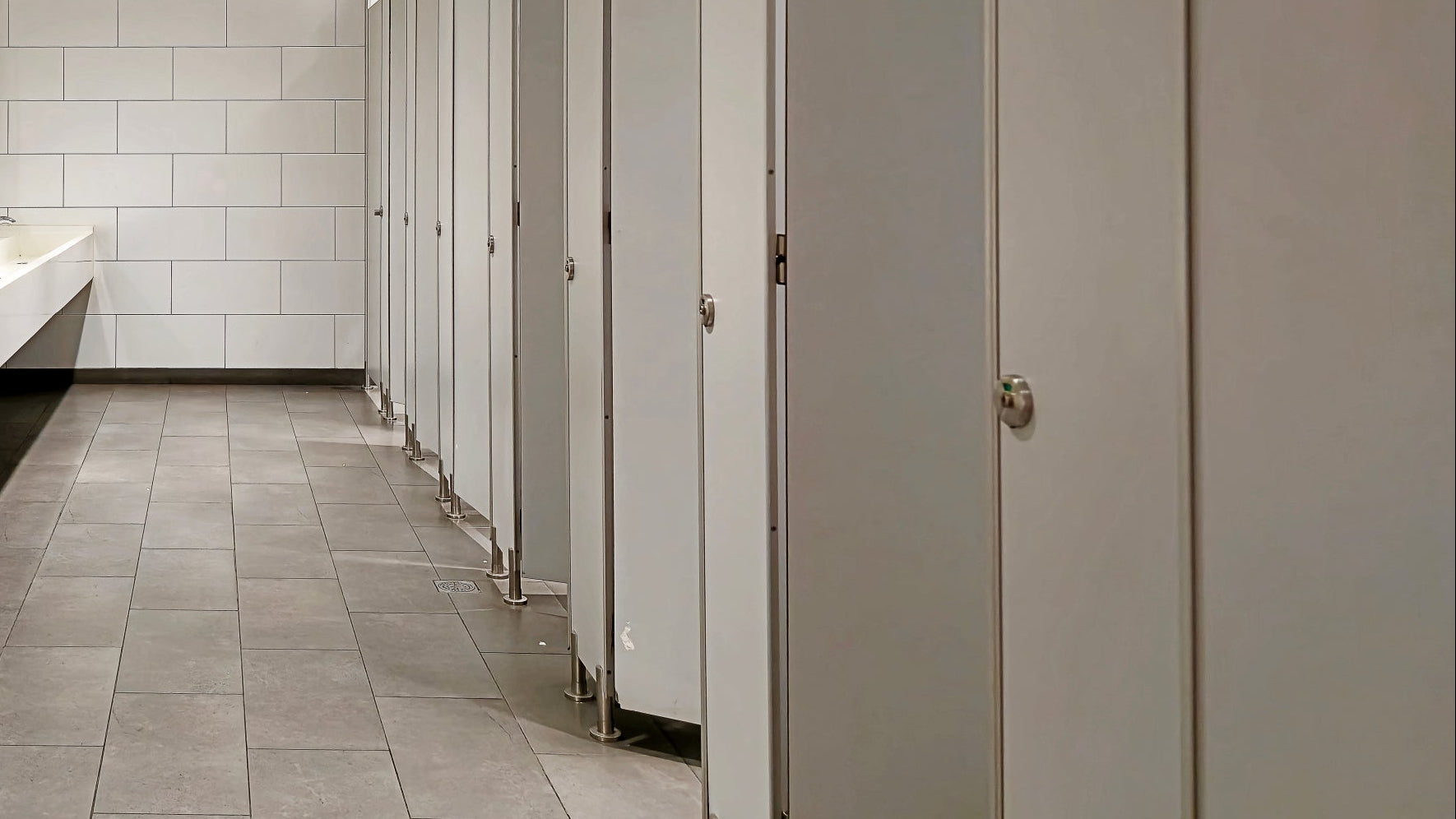 Toilet roll dispensers in a clean public washroom at a shopping centre
