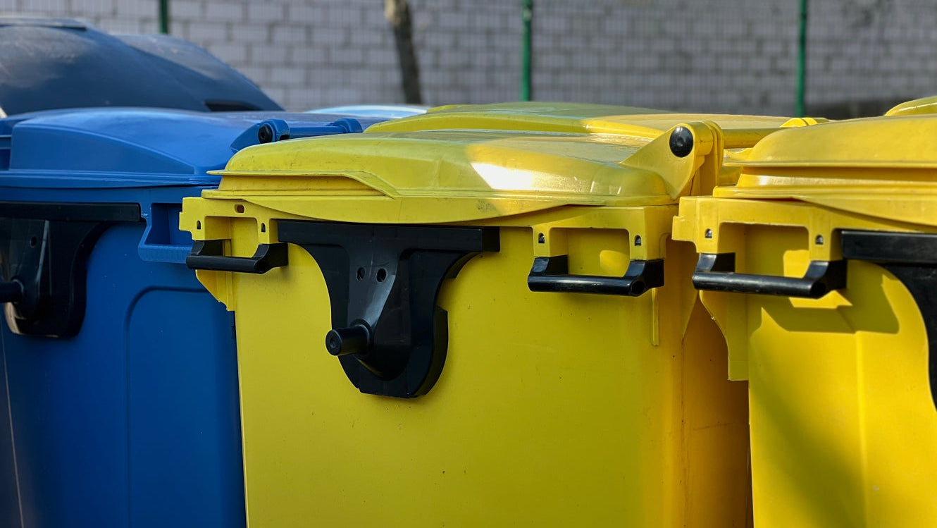 Skip disposal: 1100 litre wheelie skips for waste separation outdoors