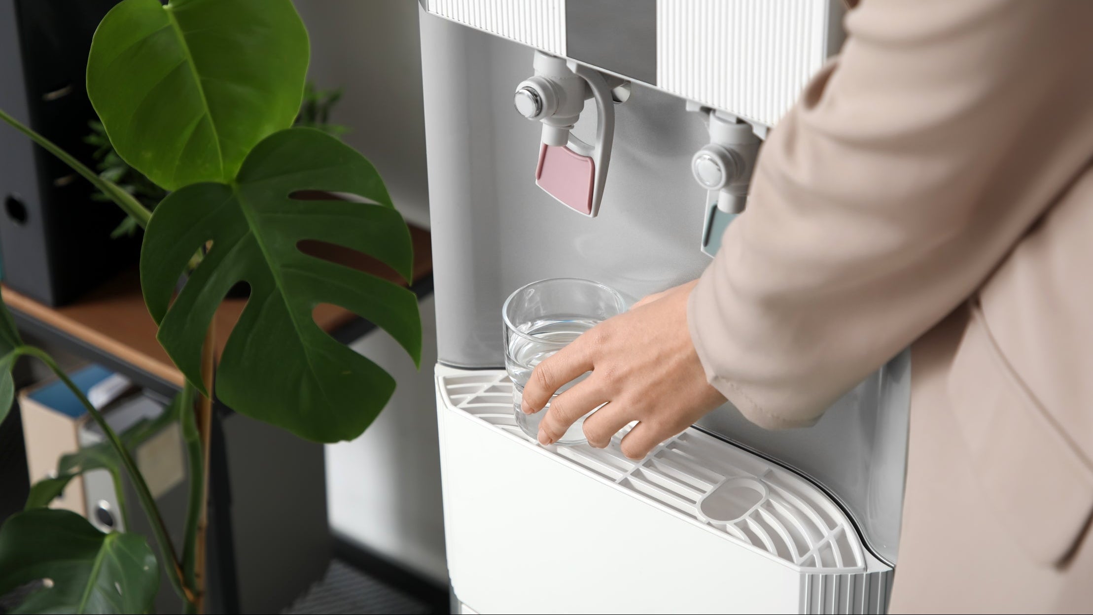 Hydration station mats: a glass being filled at an office water cooler