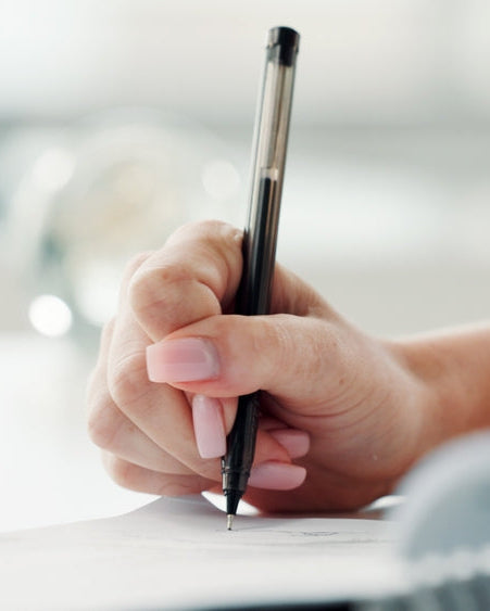 Public and Product Liability Insurance: signing a policy document